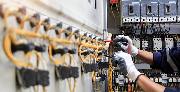Professional Electrician technician working in Evans, CO